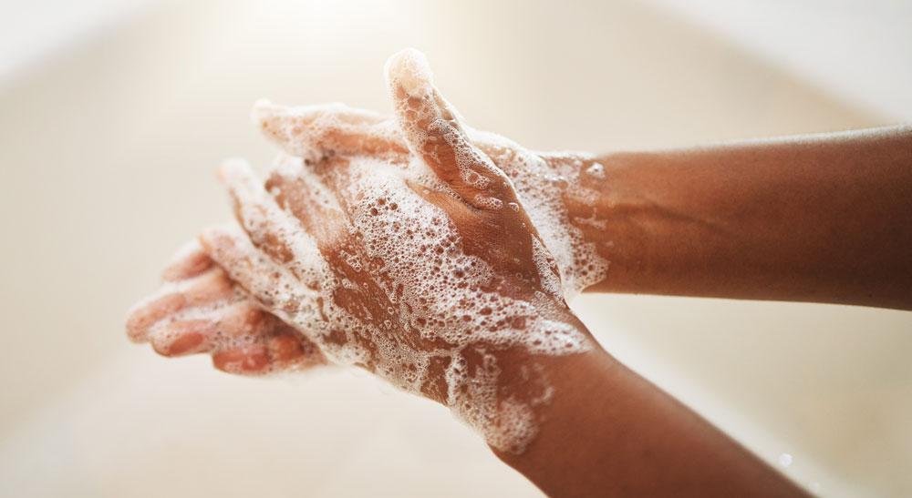 Hands washing with soap and water
