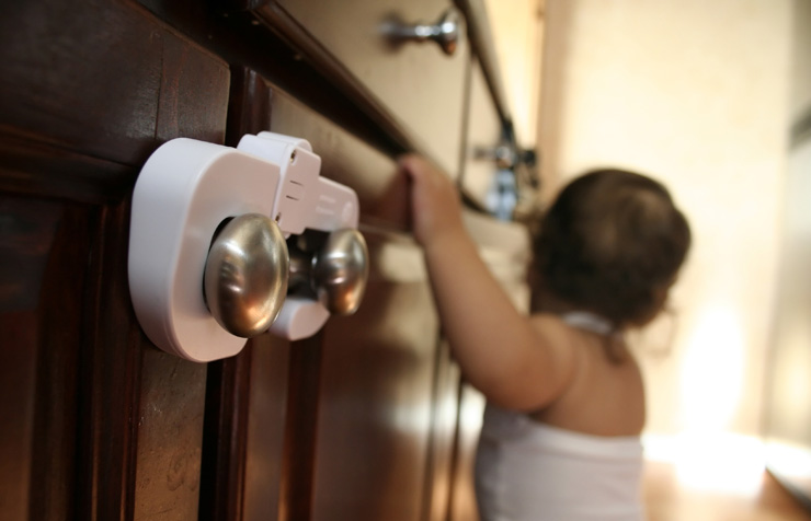 Child-proof cabinet door lock