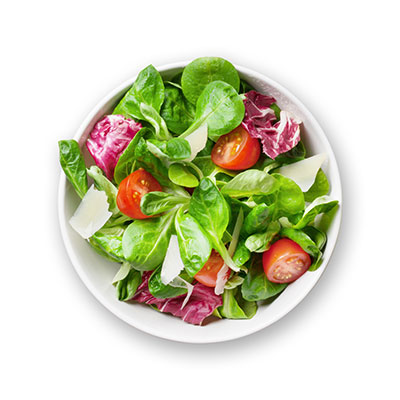 Colorful salad with greens, tomatoes, and cheese