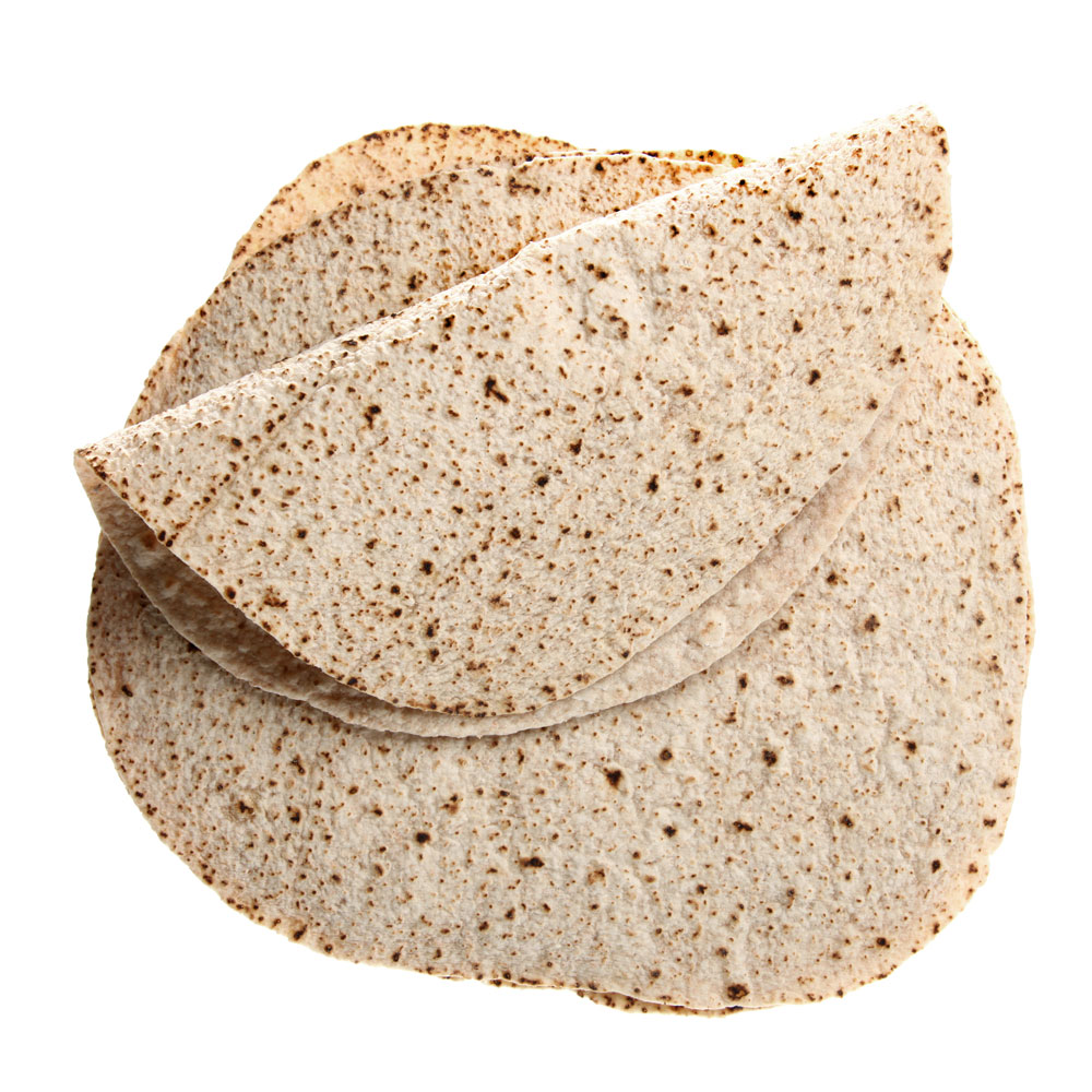 Stack of whole wheat tortillas overlapping each other