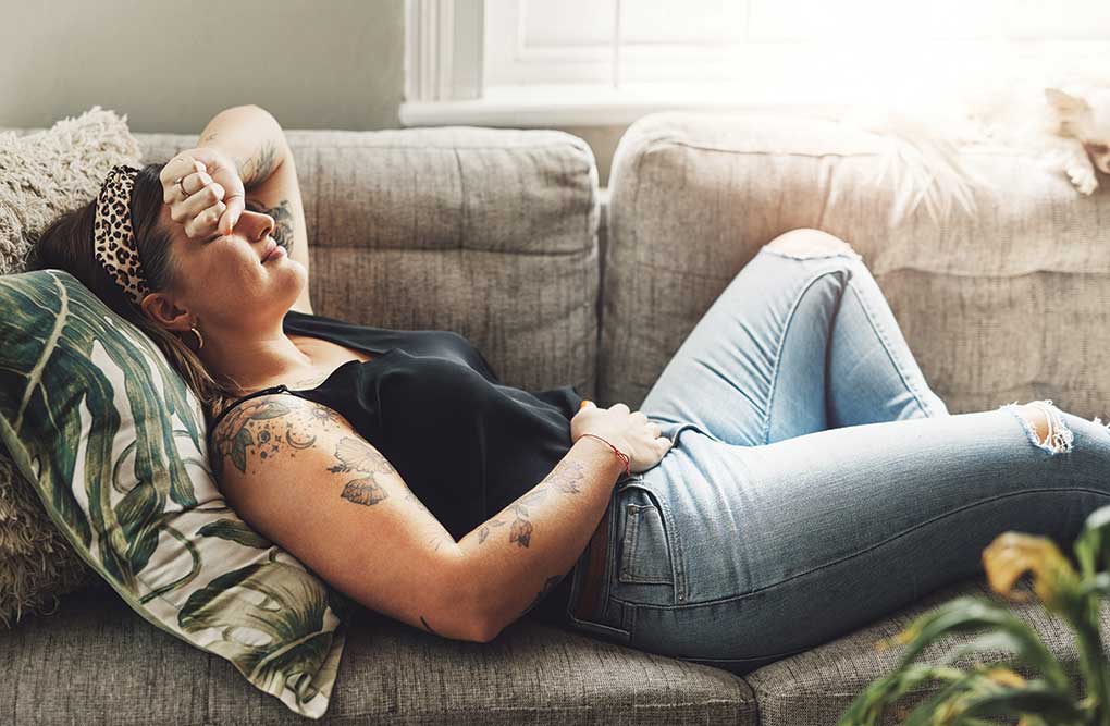 Lady-Ill-RecliningOnCouch.jpg